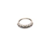 A 9ct HALLMARKED WHITE GOLD SEVEN STONE DIAMOND HALF ETERNITY RING. FINGER SIZE K. WEIGHT 2.2grms.