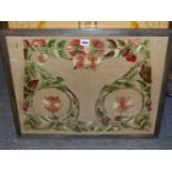 A FRAMED ART NOUVEAU SILK WORK, POSSIBLY FOR A CHAIR SEAT, SEWN WITH GREEN LEAF ROUNDELS CENTRED