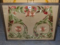 A FRAMED ART NOUVEAU SILK WORK, POSSIBLY FOR A CHAIR SEAT, SEWN WITH GREEN LEAF ROUNDELS CENTRED