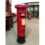A PAINTED TIN LETTER BOX INSCRIBED WITH LETTERS FOR SANTA, TIMES OF COLLECTIONS AND EIIR. H 118cms.