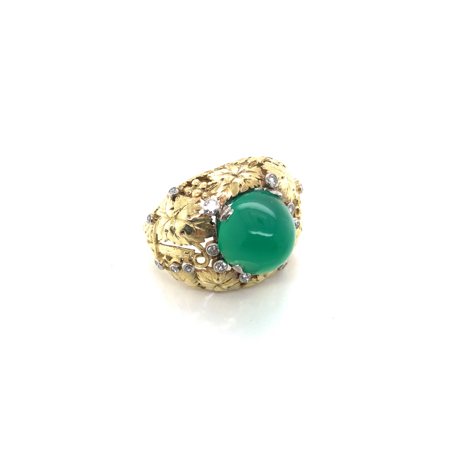 A CHRYSOPRASE DOMED CABOCHON AND ROUND BRILLIANT CUT DIAMOND FOLIATE BOMBE RING. THE CABOCHON APPROX - Image 3 of 5