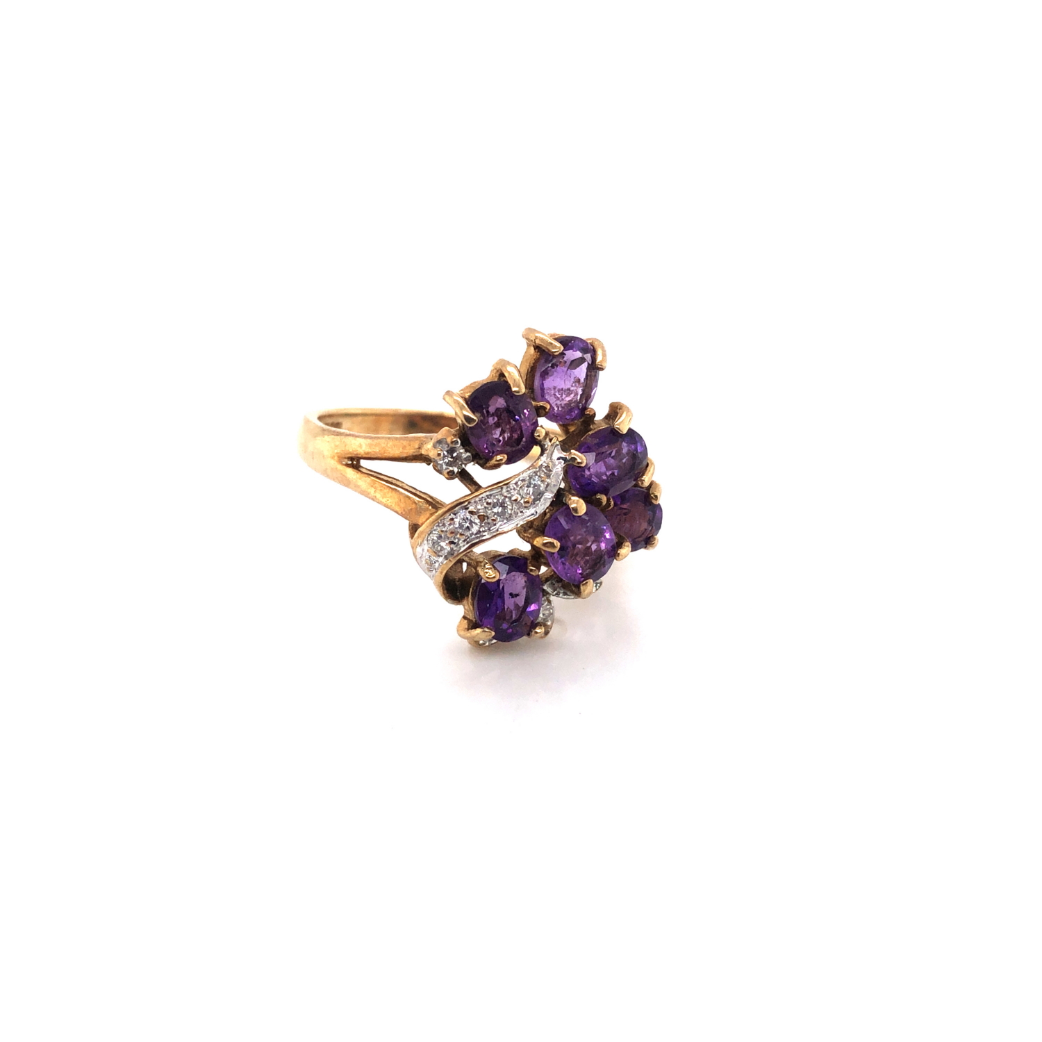 A VINTAGE HALLMARKED 9ct GOLD AMETHYST AND DIAMOND ASYMMETRIC FOLIATE DESIGN RING. DATED 1992,