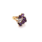 A VINTAGE HALLMARKED 9ct GOLD AMETHYST AND DIAMOND ASYMMETRIC FOLIATE DESIGN RING. DATED 1992,