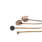 A GROUP OF 9ct, 15ct AND OTHER ANTIQUE AND VINTAGE STICK PINS SET WITH DIAMONDS, OPAL, PEARLS,