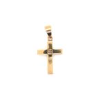 A DIAMOND SET CROSS PENDANT. THE DIAMOND CENTRE APPROX 4.5 X 2.8mm. THE BACK STAMPED 18c AND