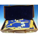 A LEATHER CASE OF MID 20th C. GLOUCESTERSHIRE FREEMASONS REGALIA, TO INCLUDE THREE SILVER GILT
