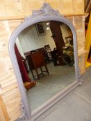 A VICTORIAN STYLE ROUND ARCHED MIRROR IN A BEADED GREY PAINTED FRAME TOPPED BY A TREFOIL FLANKED