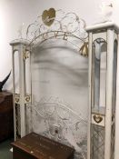 A WHITE AND GILT METAL GARDEN BOWER GATE, THE ARCH INSCRIBED LOVE SUPPORTED ON COLUMNS DECORATED