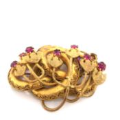 AN ANTIQUE VICTORIAN LOVERS KNOT BROOCH, WITH PINK PASTE DROPS TO THE BELL FLOWER DECORATION, SET IN