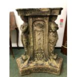 A ANTIQUE COADE STONE SUNDIAL PEDESTAL, THE TRIANGULAR TOP ABOVE CLASSICAL FIGURES STANDING AT EACH