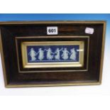 A FRAMED WEDGWOOD BLUE JASPER PANEL DEPICTING THE DANCING HOURS, THE PANEL. 7 x 18.5cms.