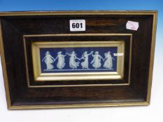 A FRAMED WEDGWOOD BLUE JASPER PANEL DEPICTING THE DANCING HOURS, THE PANEL. 7 x 18.5cms.