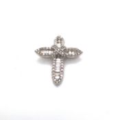 A 9ct HALLMARKED WHITE GOLD CROSS, CHANNEL SET WITH BAGUETTE DIAMONDS WITHIN BORDER OF GRAIN SET