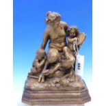 A 19th C. TERRACOTTA GROUP OF A FEMALE SATYR WITH GRAPES IN HER HAIR, A CHILD ON HER LAP PLAYING A