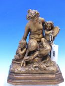 A 19th C. TERRACOTTA GROUP OF A FEMALE SATYR WITH GRAPES IN HER HAIR, A CHILD ON HER LAP PLAYING A