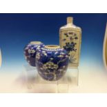 A EARLY. CHINESE BLUE AND WHITE SQUARE SECTIONED BOTTLE PAINTED WITH PANELS OF LOTUS,