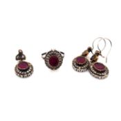 A RUBY AND CUBIC ZIRCONIA THREE PART JEWELLERY SUITE CONSISTING OF A PAIR OF DROP EARRINGS, A