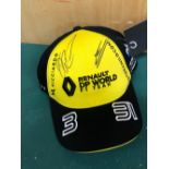 FORMULA 1 RENAULT- A YELLOW SIGNED CAP SIGNED BY DANIEL RICARDO AND ESTABAN OCON TO BE SOLD IN SUP