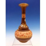 A DOULTON BOTTLE VASE, THE BROWN TRUMPET NECK POWDERED WITH GOLD ABOVE TWO RED CHERRY BLOSSOM