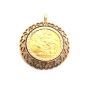 A 22ct GOLD 1907 FULL EDWARDIAN SOVEREIGN COIN ENCASED IN A 9ct HALLMARKED GOLD PENDANT MOUNT WITH A