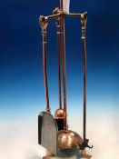 AN ARTS AND CRAFTS COPPER COMPANION SET, THE BRUSH POKER AND SHOVEL WITH HEART SHAPED HANDLES