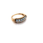 A HALLMARKED 9ct YELLOW GOLD AQUAMARINE AND DIAMOND HALF HOOP RING. FINGER SIZE O 1/2. WEIGHT 3.