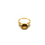 A HALLMARKED 9ct YELLOW GOLD YELLOW QUARTZ DRESS RING. FINGER SIZE N. WEIGHT 3.41grms.