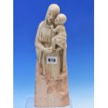 AN ITALIAN PORCELAIN MADONNA AND CHILD CHEEK TO CHEEK AND MOUNTED ONTO A TERRACOTTA BASE. H 31.