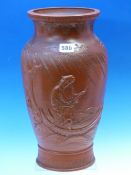 A CHINESE RED WARE VASE MOULDED IN RELIEF WITH A SAGE PUNTING HIS BOAT BELOW WILLOW TREES, SQUARE