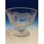 A PHOENIX CRYSTAL GLASS FOOTED BOWL WHEEL ENGRAVED WITH THREE PANELS OF PRIZE BULLS. Dia. 31.5cms.