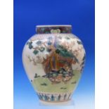 A CHINESE POLYCHROME JAR PAINTED WITH A SAGE SEATED ON THE BACK OF A CRANE FLYING ABOVE WAVES. H