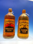 A VINTAGE BOTTLE OF GORDONS ORANGE GIN AND ANOTHER OF LEMON GIN