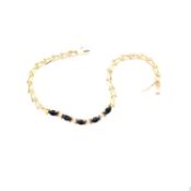 A HALLMARKED 9ct YELLOW GOLD SAPPHIRE AND CUBIC ZIRCONIA LINE BRACELET. FIVE OVAL SAPPHIRES IN A