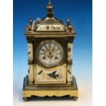 A PORCELAIN AND BRASS CASED JAPY FRERES CLOCK STRIKING ON A COILED ROD, THE COLUMNS, CIRCULAR