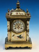 A PORCELAIN AND BRASS CASED JAPY FRERES CLOCK STRIKING ON A COILED ROD, THE COLUMNS, CIRCULAR