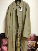 A VINTAGE BURBERRYS TRENCH COAT WITH NOVA CHECK LINING.