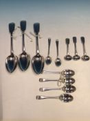 A GROUP OF HALLMARKED SILVER SPOONS INCLUDING THREE SALT SPOONS, THREE SERVING SPOONS, A PAIR OF TEA