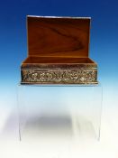 AN INDIAN WHITE METAL REPOUSSE DECORATED WALNUT LINED HINGE TOP CASKET 18.5 CM WIDE