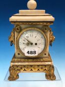 AN ORMOLU MOUNTED WHITE MARBLE CASED TIMEPIECE, THE ENAMEL DIAL WITH ARABIC NUMERALS FLANKED BY LION