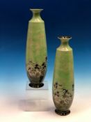 A PAIR OF DOULTON VASES BY ELIZA SIMMANCE, THE SLENDER OVOID SHAPES GLAZED IN GREEN ABOVE ROSES