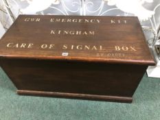 A VINTAGE PINE TRUNK, THE LID INSCRIBED IN WHITE GWR EMERGENCY KIT KINGHAM CARE OF SIGNAL BOX. W