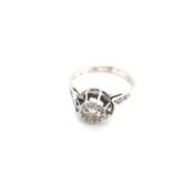 A VINTAGE DIAMOND SOLITAIRE RING COMPLETE WITH ROSE CUT DIAMOND SET SHOULDERS. THE PRINCIPLE DIAMOND