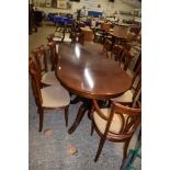 REPRODUCTION MAHOGANY TWIN PEDESTAL EXTENDING DINING TABLE WITH THREE LOOSE LEAVES, 109CM WIDE