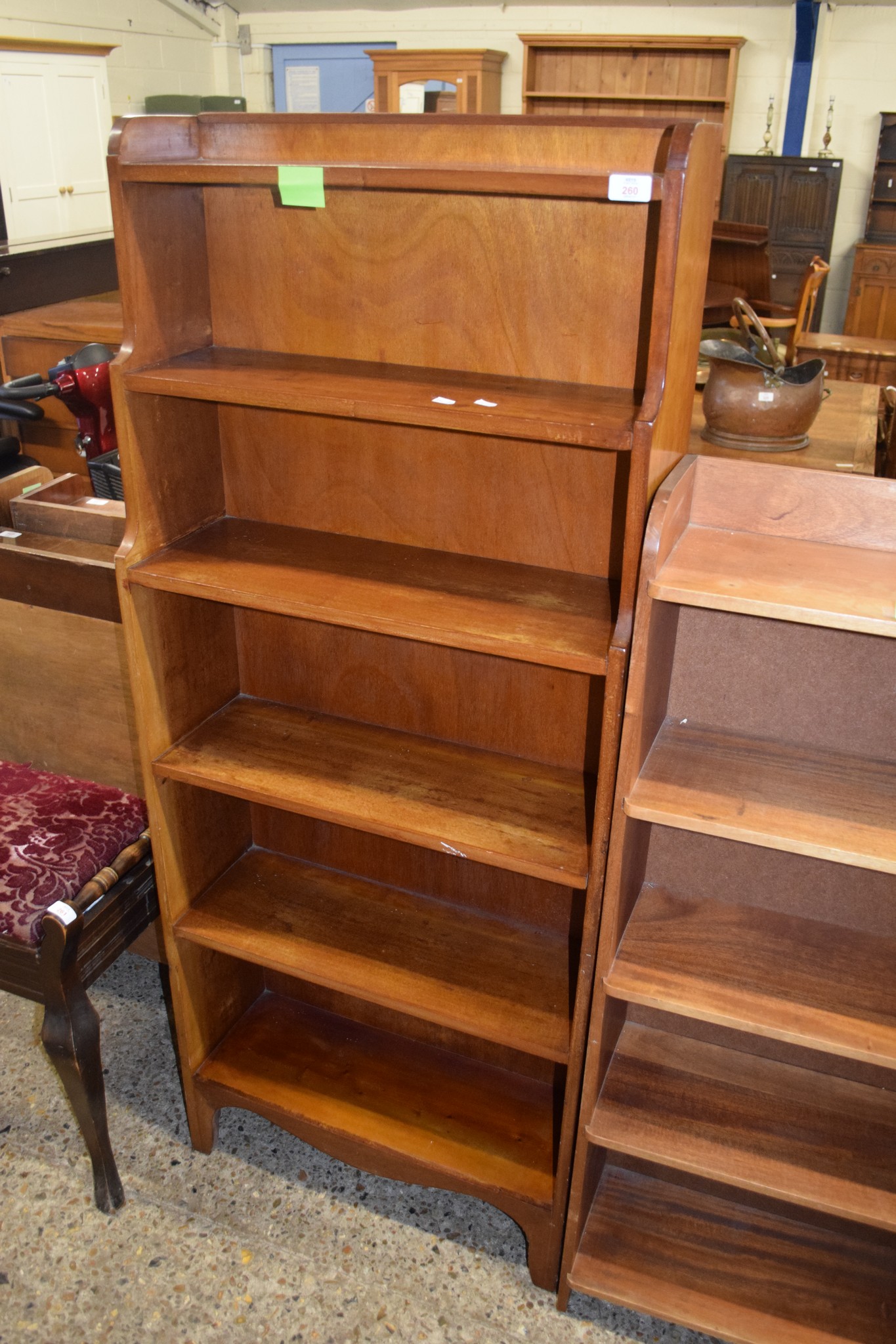 MAHOGANY “WATERFALL” TYPE BOOKCASE, 63CM WIDE