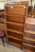 MAHOGANY “WATERFALL” TYPE BOOKCASE, 63CM WIDE