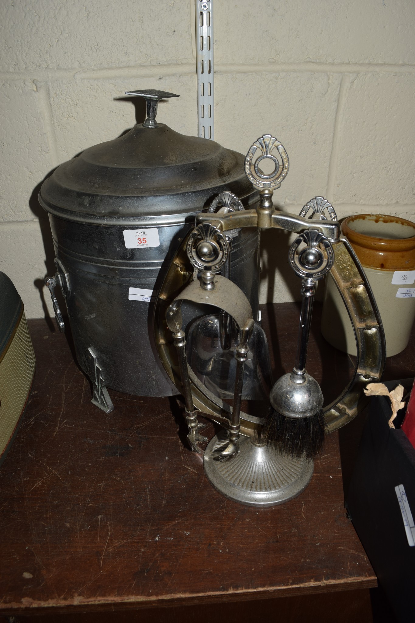 FIRESIDE IMPLEMENTS IN SILVER METAL BOX