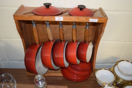 SET OF LE CREUSET TYPE SAUCEPANS WITH WOODEN HANDLES