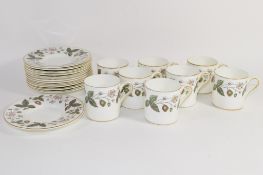 Wedgwood coffee set decorated with the Strawberry Hill pattern comprising 8 coffee cans and saucers,