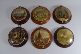 Group of six pot lids in light oak frames, various scenes including Albert Memorial, Royal Harbour