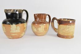 Group of three Royal Doulton Harvest ware jugs including one to commemorate the Jubilee of Queen
